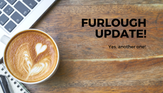 Cup of coffee and laptop